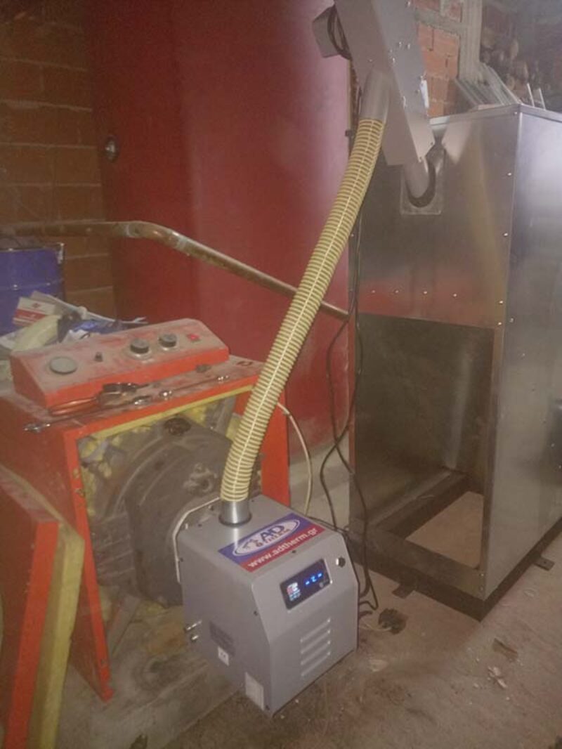 Καυστήρας βιομάζας σε μαντεμένιο λέβητα πετρελαίου REMEHA στην Στρατονίκι